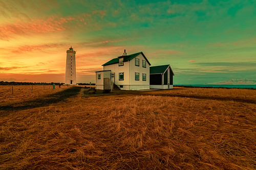 iceland grottalighthouse lighthousekeepers grass sunset