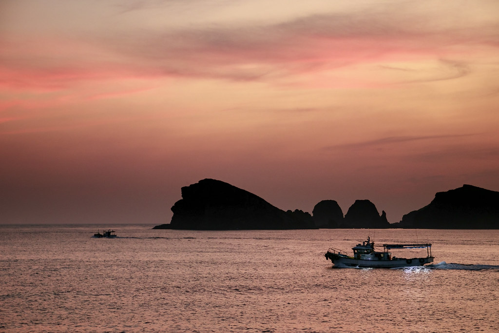 Fishing Boat Crossing in the Twilight