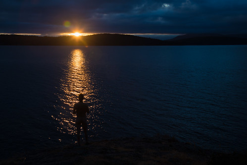silhouette sunrise male nude water reflection sparkle olga washington unitedstates us