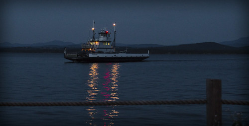 ferry lake boat ship crossing lights reflection mountains ferryboat travel tour holiday vacation visit water freshwater transportation transport carcarrier car float excursion sunset night twilight darkness nightshot lighting boating shipping mountain