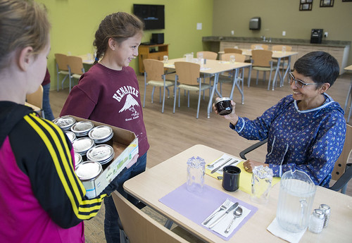 Megan Whittom and Emilee Wilson deliver freshly made blueberry jam to Sharon Isaak and other Elders at Tyotkas Elder Center at the conclusion of the Yaghanen Youth Program's Harvest Camp in August.