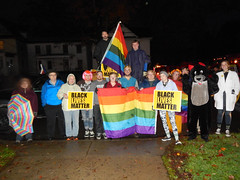 LGBT Walking Unit before step off for parade, including members of Crawford Area LGBT+, Unitarian Universalist CHurch of Meadville, Showing Up for Racial Justrice Crawford County, Allegheny College grouos Why Not Us? and Gender Sexuality Alliance