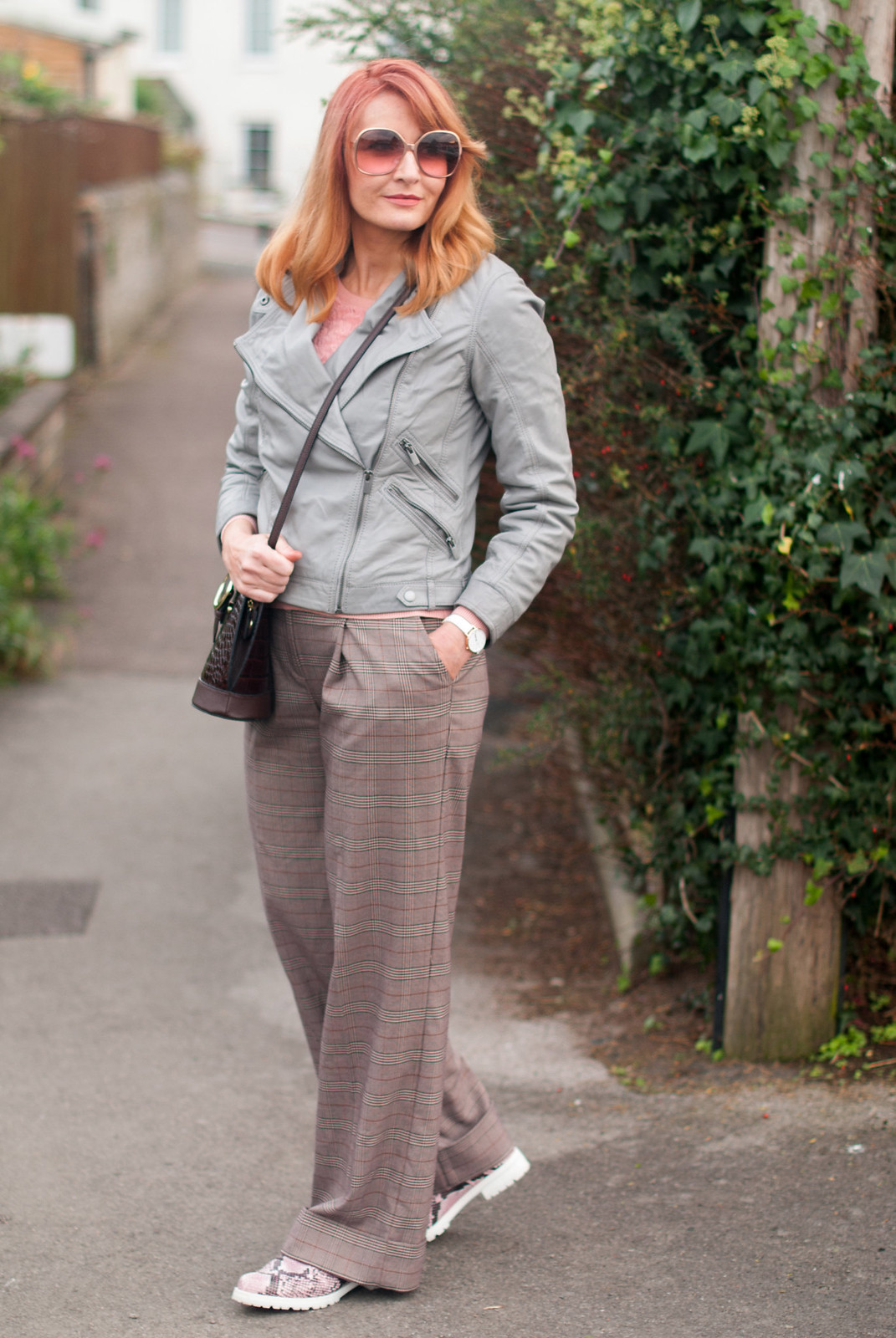 Smart but comfy autumnal dressing: Grey leather biker jacket millennial pink sweater brown check wide leg pants pink snakeskin shoes | Not Dressed As Lamb, over 40 style