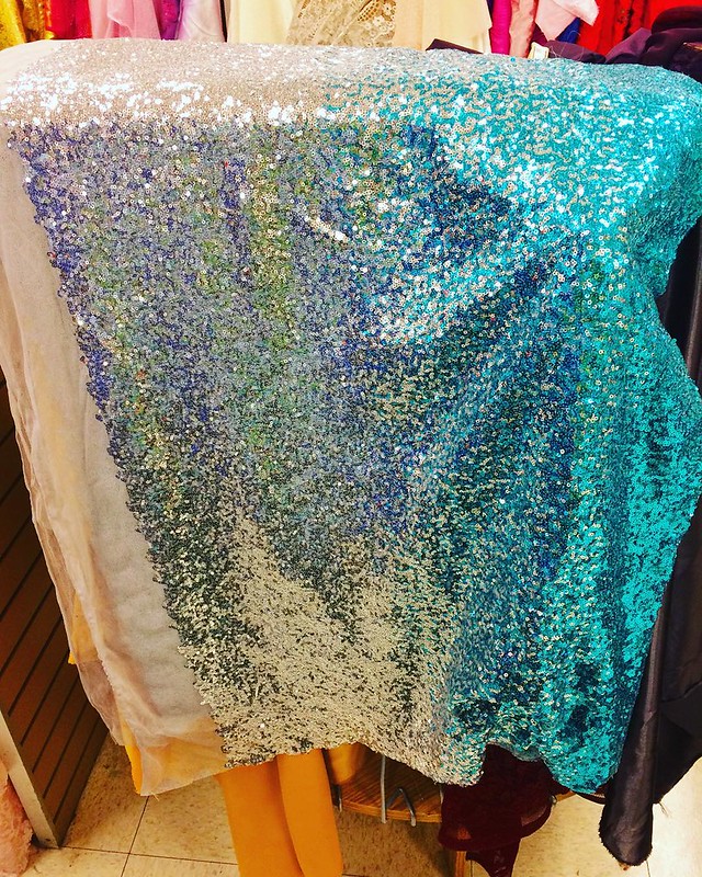 Spotted recently at the fabric store...ohhhh the things I'd like to do with YOU, ombré turquoise sequin fabric! 😍
