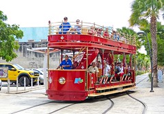 Tram, Oranjestad, Aruba: Red car westbound entering the Kleistraat passing loop on Caya Betico Croes
