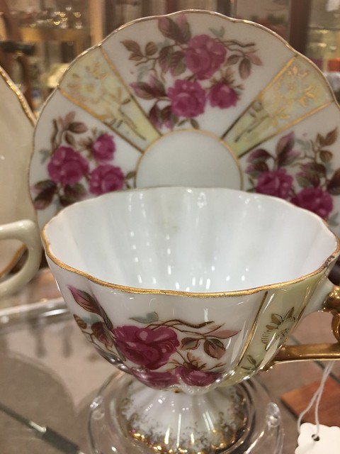 cup and saucer,  pink and gold leaf