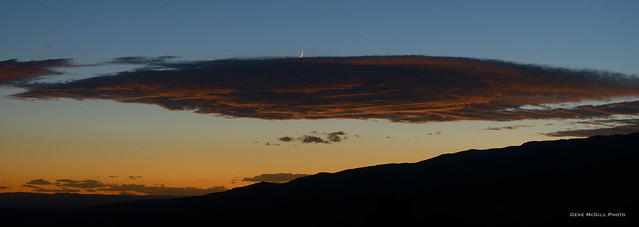 Jupiter and the Moon slip behind a mountain wave cloud in Western Colorado