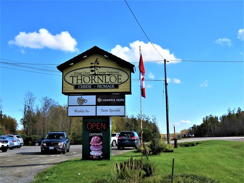 thornloecheeseoutletstore highway11north townshipofharley districtoftimiskaming ontario northeastern canada prout geraldwayneprout canon canonpowershotsx60hs powershot sx60 hs digital camera photographed photography scenery building signage thornloe cheese outlet factory outletstore store highway11 highway district timiskaming northernontario township harley