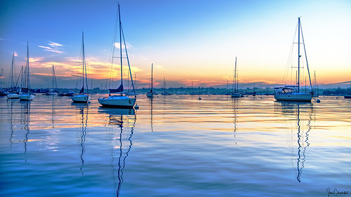 boats sunrise sunset dawn bay harbor water reflection sailboat ship town sky clouds cpf polarizingfilter