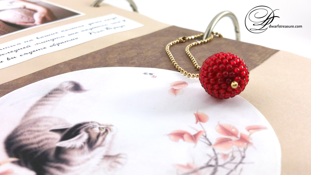 Pretty rich red color beaded ball charm