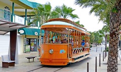 Tram, Oranjestad, Aruba: Orange car at the Plaza Nikki terminus at the east end of Caya Betico Croes