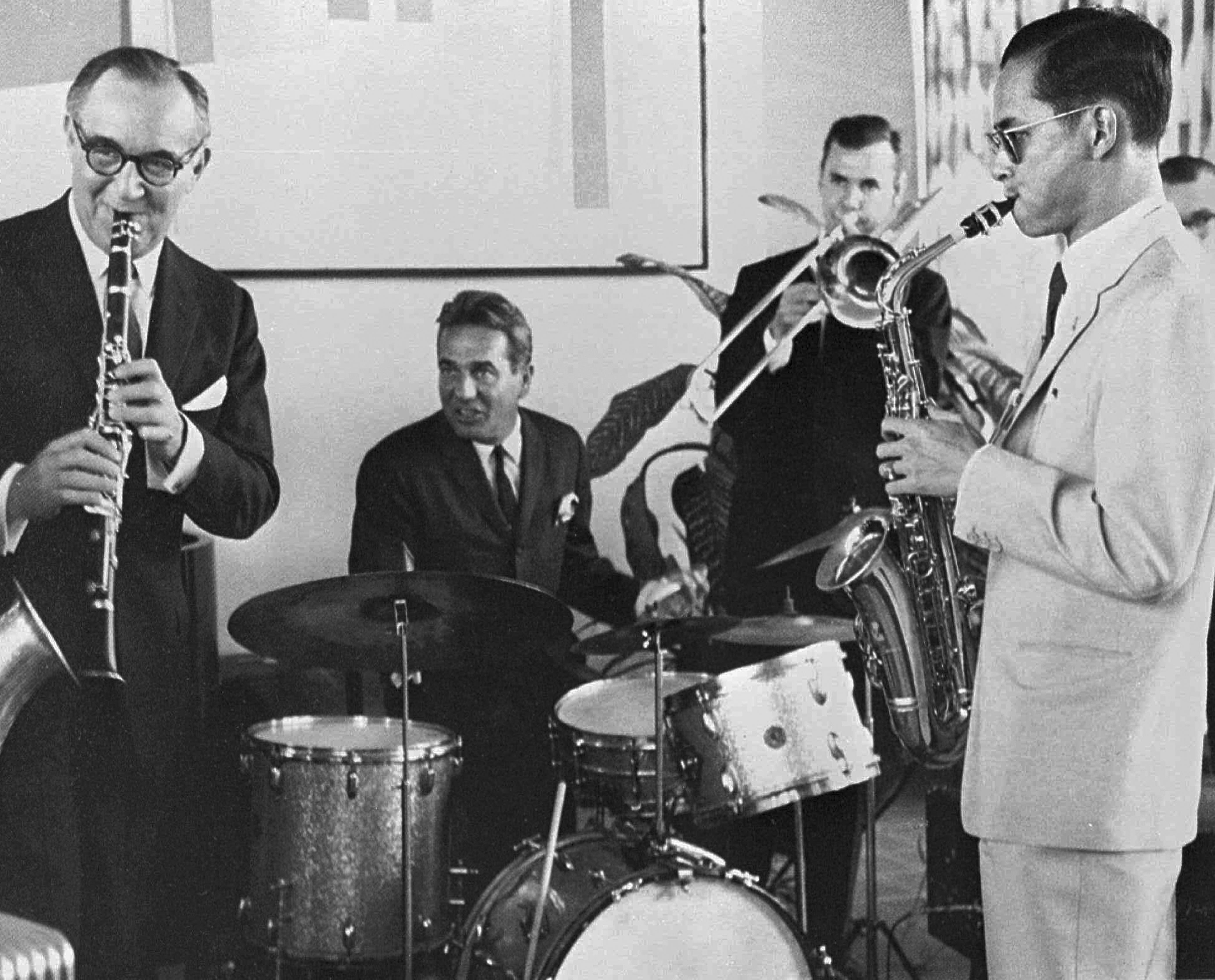 In this July 5, 1960, file photo, Thailand's King Bhumibol Adulyadej, right, plays the saxophone during a jam session with legendary jazz clarinetist Benny Goodman, left, drummer Gene Krupa, second left, and trombonist Urbie Green in New York. (Bureau of the Royal Household via AP, File)