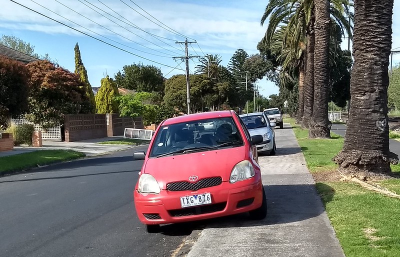 Parked cars blocking footpath