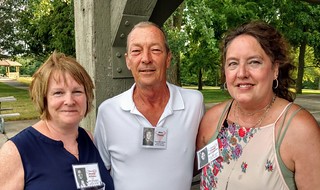 IMG_20170721_185859788_HDR Classmates Wendy G (Myers) Stevens, Mike Hapes and Susan L (Case) McLaughlin at their Ames High School 45-year class reunion Friday evening Moore Park Ames Iowa July 21 2017 659pm