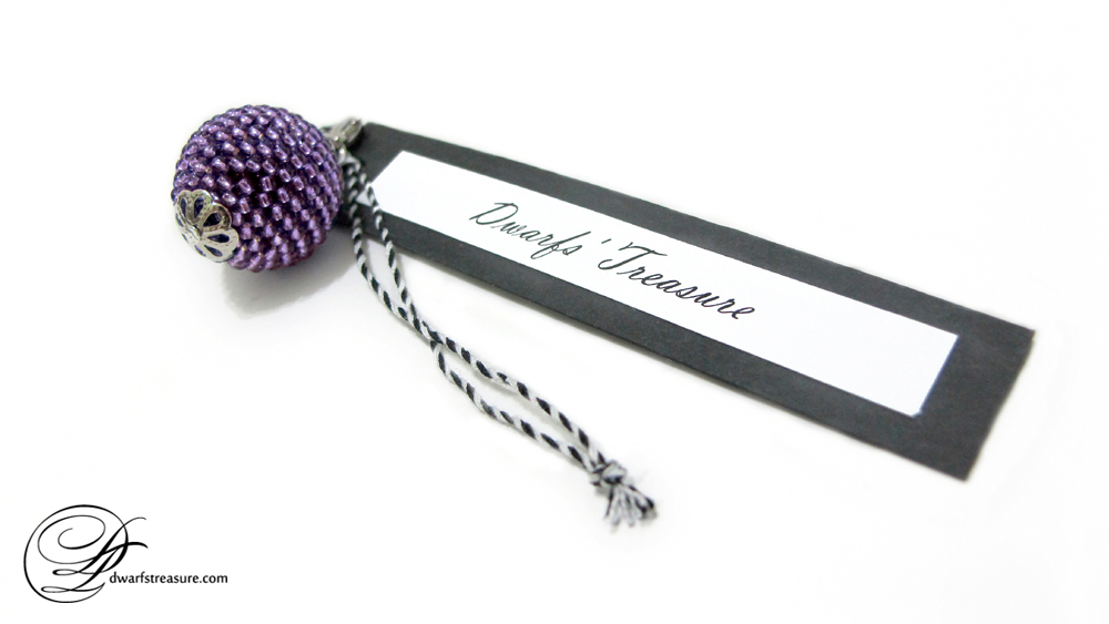 Elegant ultraviolet seed bead ball pendant with tag