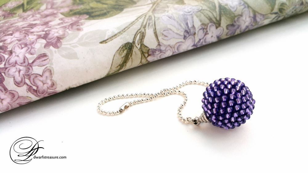 Fancy purple beaded ball pendant with short ball chain