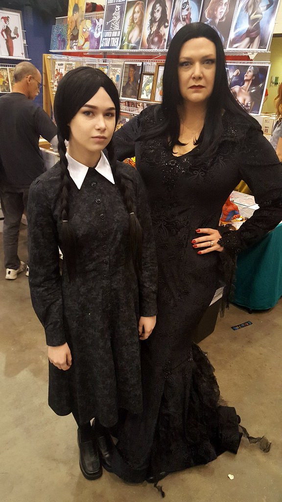 Charles Addams' Wednesday and Morticia. Fantastic Literary Cosplays from Grand Rapids Comic Con