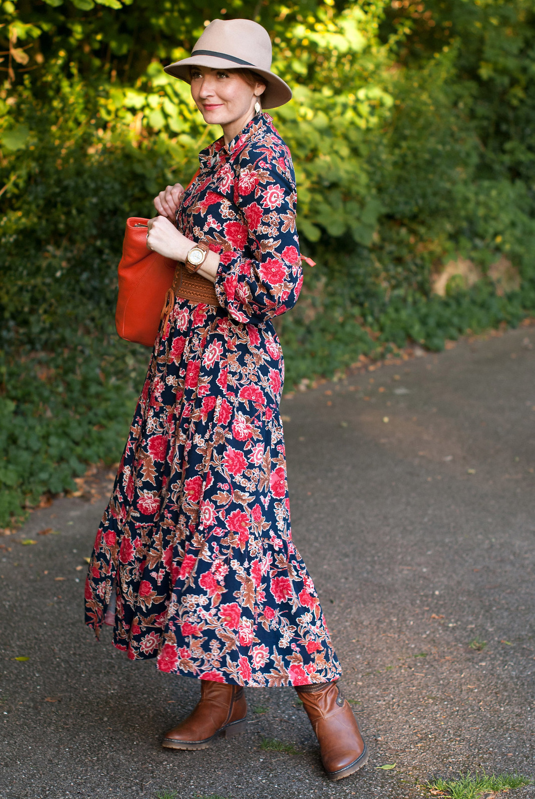 Romantic, Ralph Lauren-inspired 70s style autumn/fall outfit: Floral maxi dress tan belt and boots camel fedora orange leather tote bag | Not Dressed As Lamb, over 40 style
