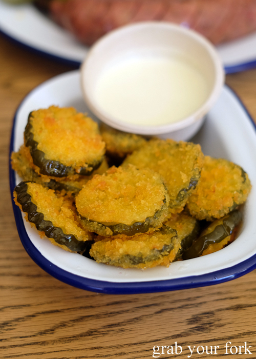 Fried pickles with blue cheese sauce at Hughes Barbecue at The George Hotel in Waterloo Sydney
