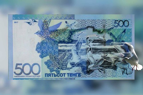 Kazakh banknote with Marcel Burkhard egull photo superimposed
