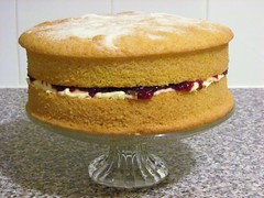 raspberry jam, whipped cream or vanilla cream sandwiched between two sponge cakes. 