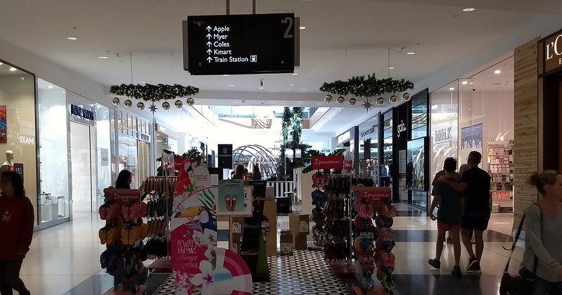 Southland shopping centre, sign pointing to station