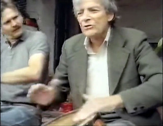 Richard Feynman playing bongos with a friend