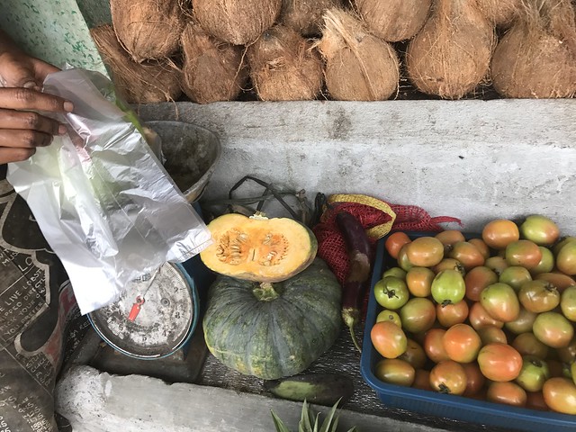 sidewalk vegetable vendor