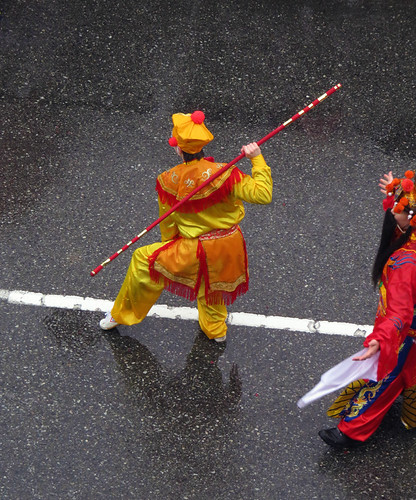 The Year of the Monkey with a cheeky monkey leading in the Chinese New Year Parade in Vancouver, Canada