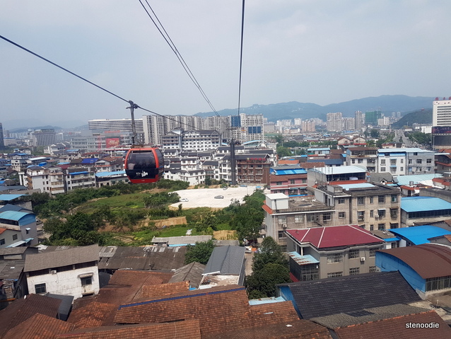 cable car above houses