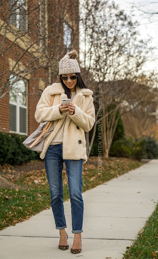 beanie with pom pom, sherpa teddy coat, camel cashmere sweater, girlfriend jeans, leather and canvas tote, leopard pumps