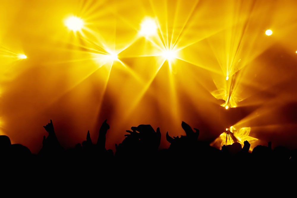 stage lights with audience silhouette
