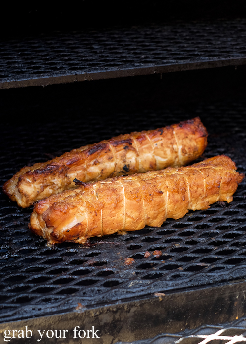 Rolled crocodiile tail on the barbecue at Hughes Barbecue at The George Hotel in Waterloo Sydney