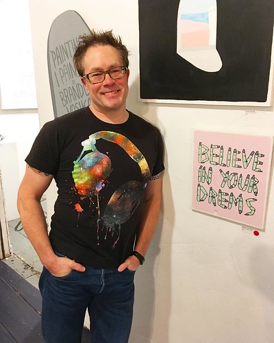 Joshy at the art show last night, in front of @brandonvosika's work. Believe in your drems!