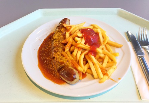 Curried fried sausage with french dries / Currywurst mit Pommes Frites