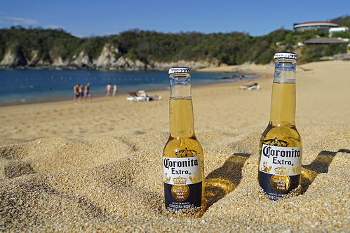 beer beerbottle corona beach mexico oaxaca huatulco water ocean playaconejos bahiaconejos sand sony sonya7ii sonyfe24240mm hotel resort secrets landscape seascape