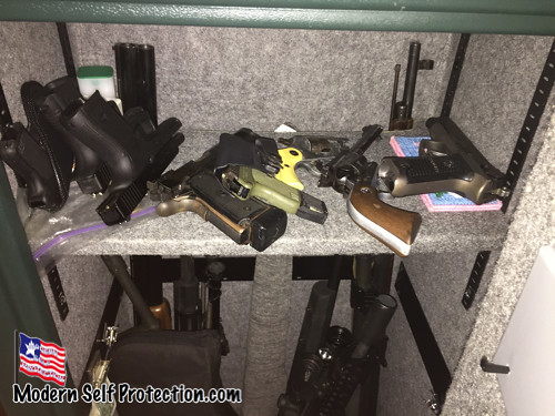 Inside a gun safe with multiple guns