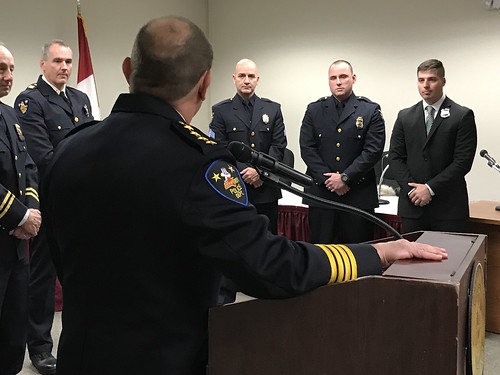 Troy Police Chief John Tedesco addressing officers during ceremony at Troy City Hall