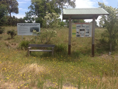 Well-located information sign and bench