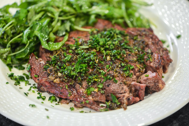 Grilled Ribeye with Herbed Brown Butter Sauce