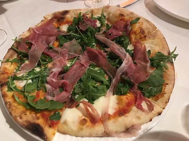 Prima, prosciutto with arugula pizza