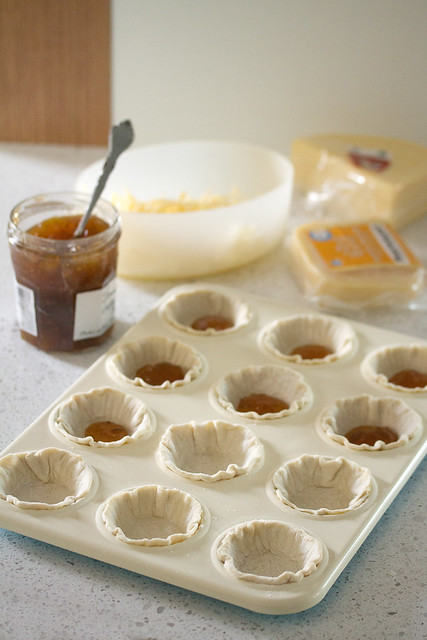 Assembling Fig and Cheese Tartlets