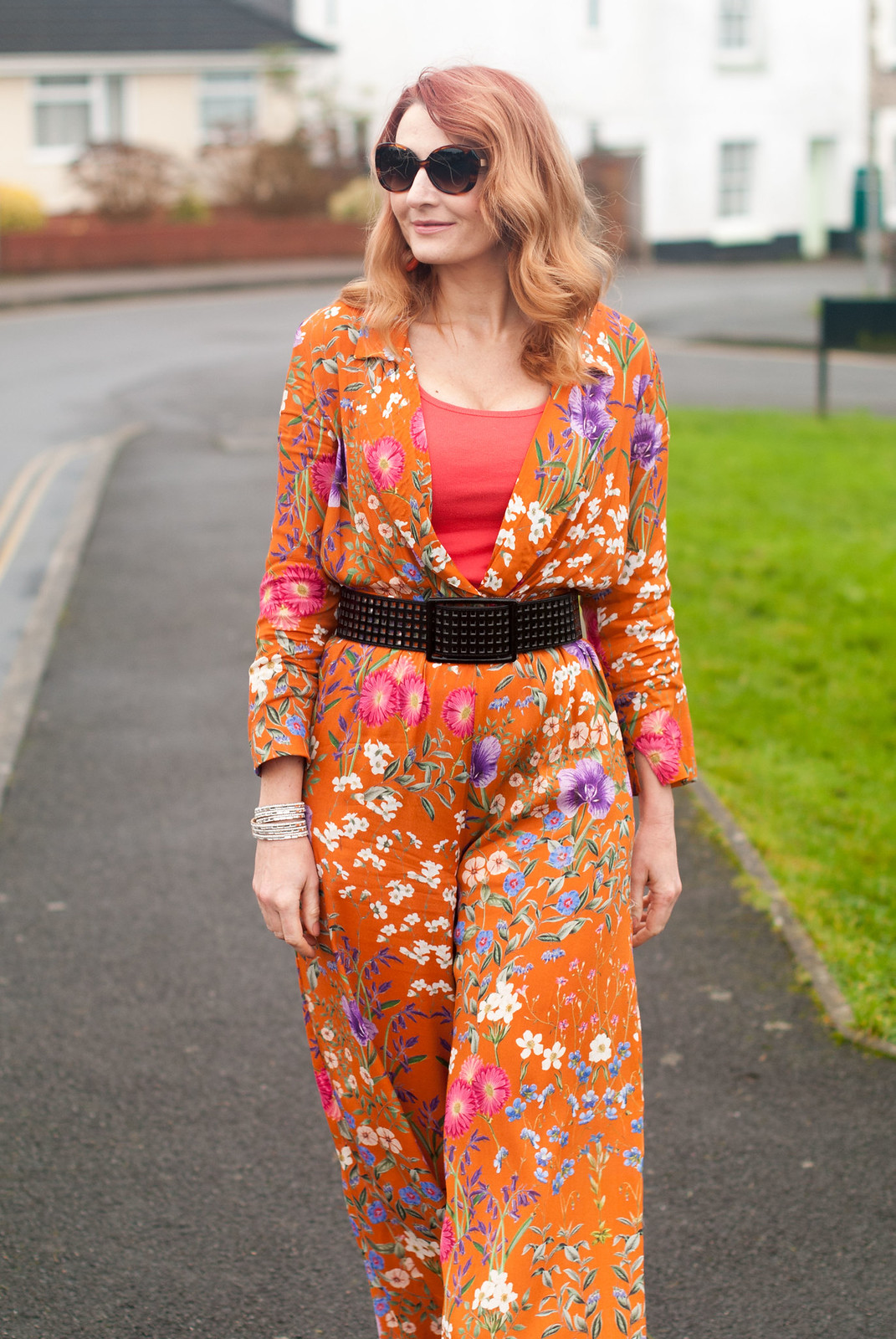Wearing Florals in Winter: Wide leg orange floral jumpsuit from Mango with black accessories | Not Dressed As Lamb, over 40 fashion and style