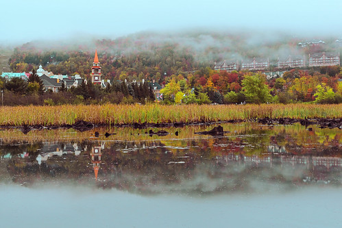 autumnmorningatmonttremblant monttremblant quebec canada autumncolours autumnmorning lowercloud misty mistymorning landscape canon5dmarkiii ef1635mmf28liiusm water reflection travel lifeng mountain monttremblantvillage