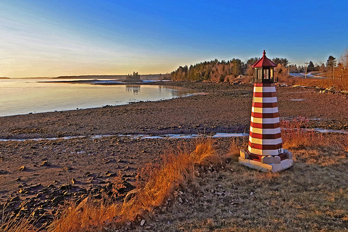 maine robbinston calais ocean shore shoreline coast beach sunrise morning light glow re orange lighthouse