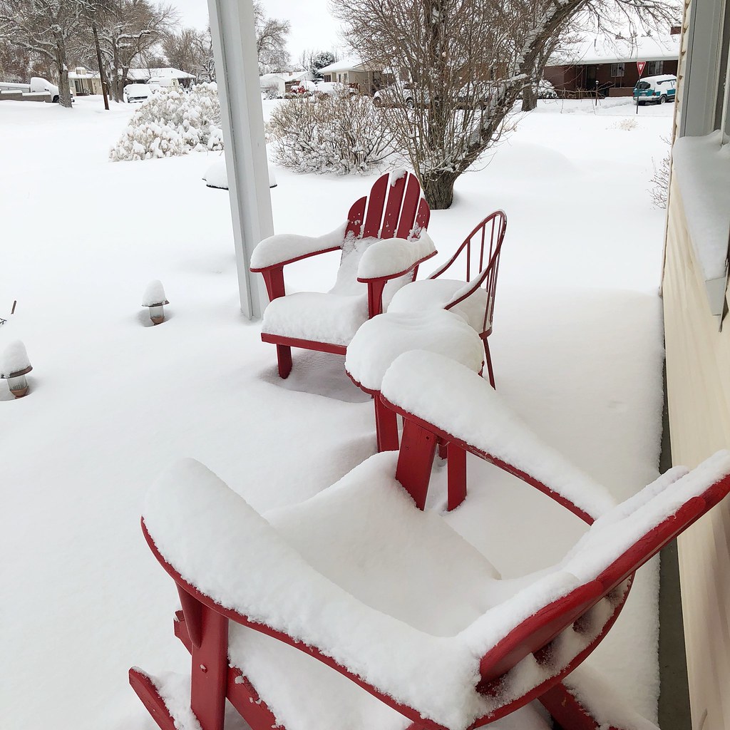 snow covered patio furniture