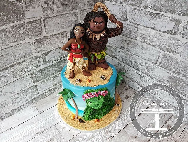 Handmade Moana and Maui on a Handpainted Cake by Verity Malinowska of Verity Jane - The Cake-Up Artist