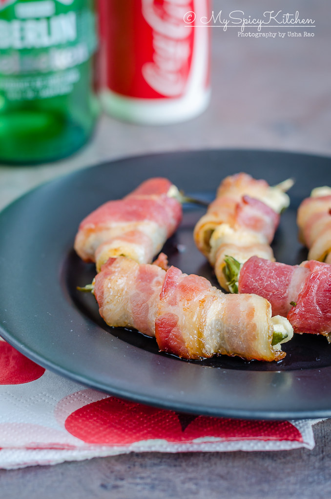 Plate of 3 ingredient bacon wrapped jalapeno poppers.