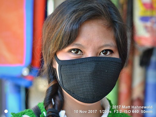 matthahnewaldphotography facingtheworld head face eyes catchlights beautifuleyes hair longhair bareheaded facemask black mouthfacemask consent lifestyle beauty health safety pollution imphal manipur northeast india asia manipuri indian asian oneperson female girl young woman picture photo nikond3100 primelens 50mm horizontal street portrait closeup outdoor color posing authentic beautiful pretty fabulous protection airpollution orientaleyes seveneighthsview headshot nikkorafs50mmf18g posingcamera lookingcamera 4x3ratio 1200x900pixels resized
