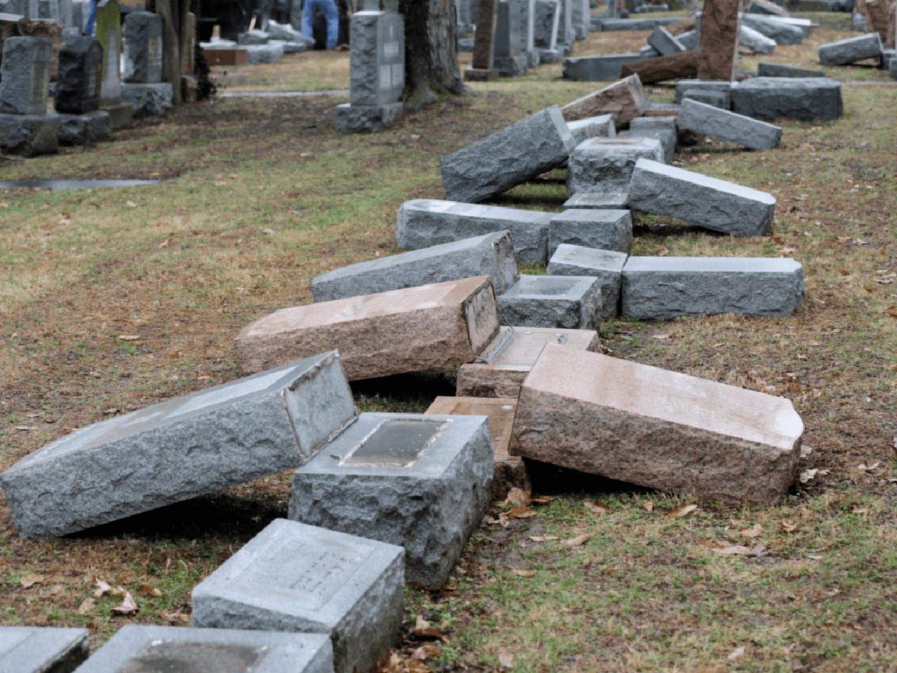 22 Photos From 2017 That Tell A Story: In the city of Saint Louis, Missouri, in the United States, Jewish graves were desecrated and more than 100 headstones were toppled in the Chesed Shel Emeth Cemetery.